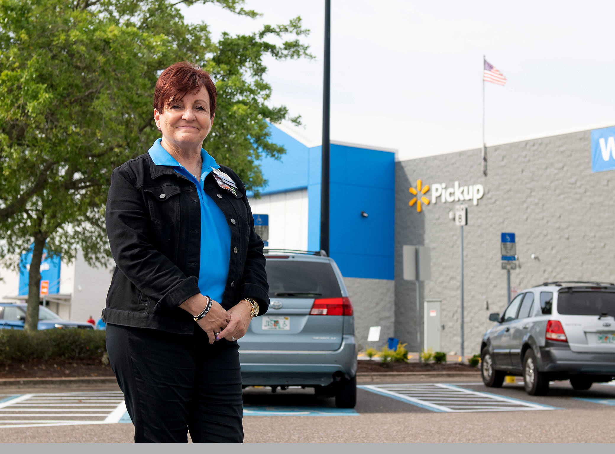 Debbie Lovelady stands outside a Walmart store.